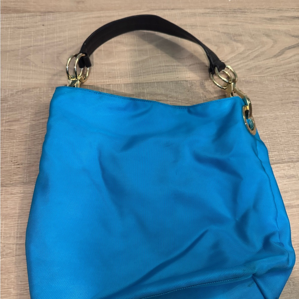 Blue Satchel with Soft Leather Material and Spacious Design